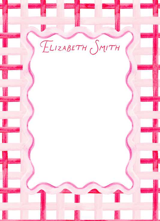 pink and red plaid notepad
